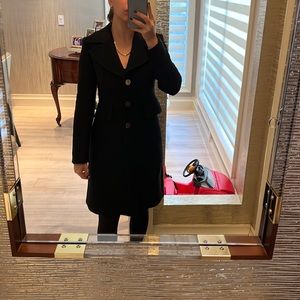 Luxurious and formal coat with gold buttons and collar